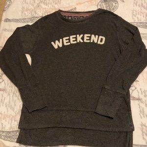 Black flowy crew neck w/ white letters on front